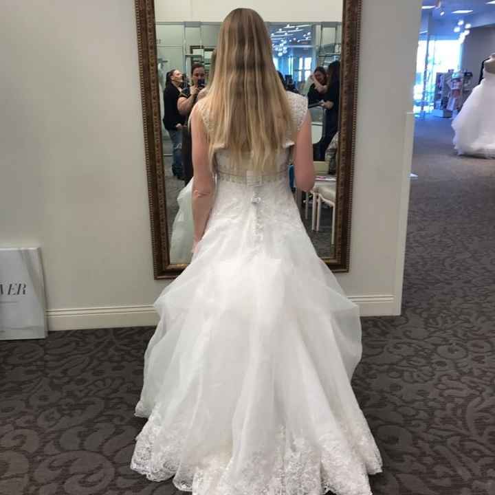 Pinning up hot sale wedding dress train