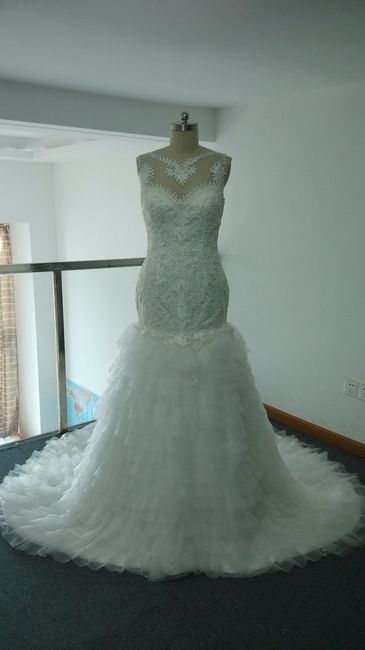 My dress will be here tomorrow...PICS