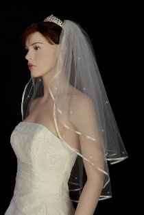 Are you still looking for a veil?   2T White Wedding Bridal Veil w/Rhinestone