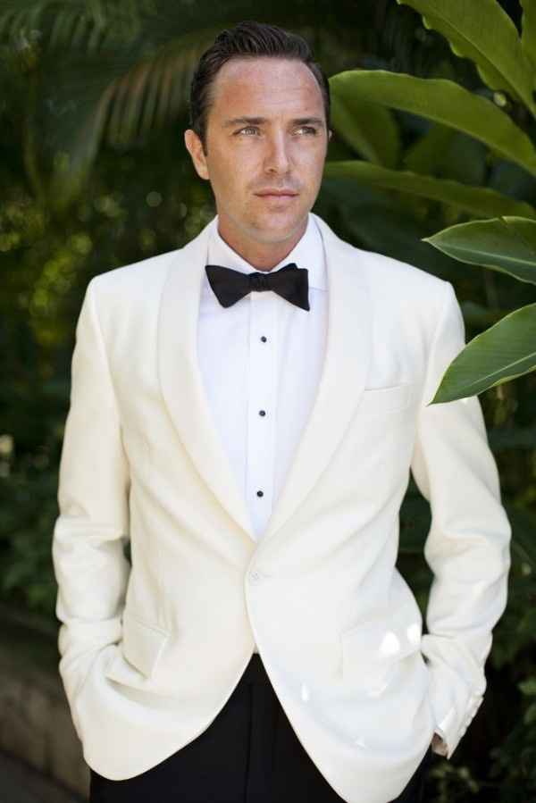 Groom wearing hot sale white