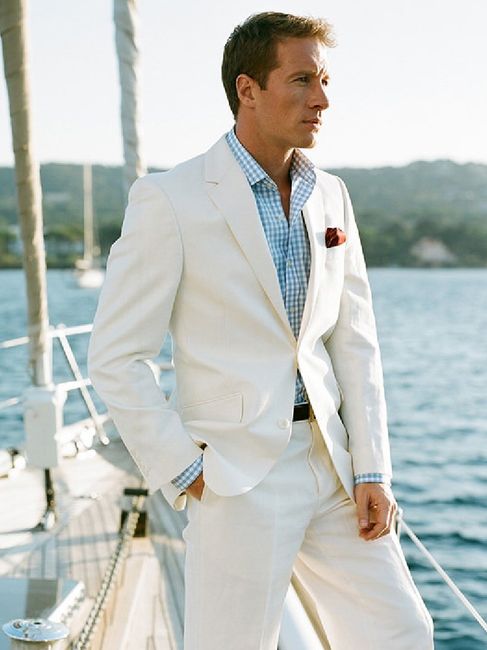 Groom wearing a white suit