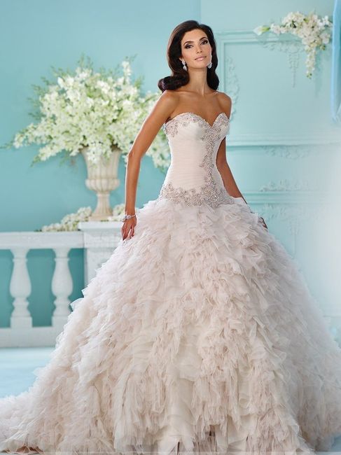 Who is your wedding dress designer? 8