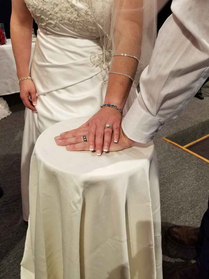 Picture of our rings on our wedding day! Hopefully you can see them!