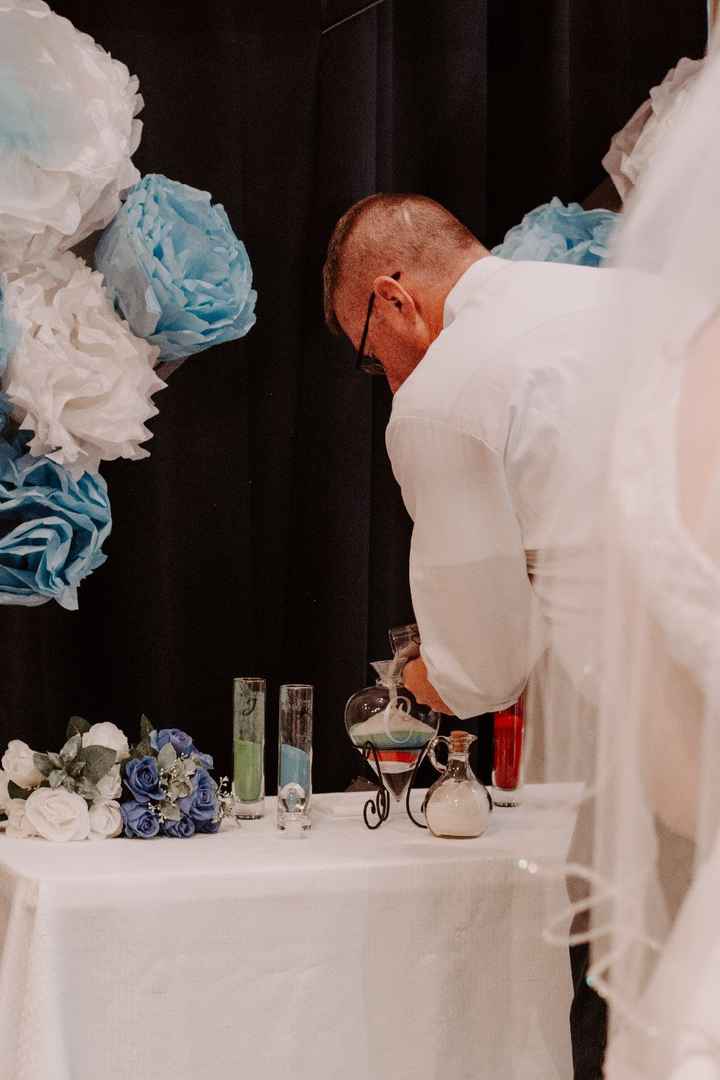 My husband pouring his sand for the unity sand ceremony!