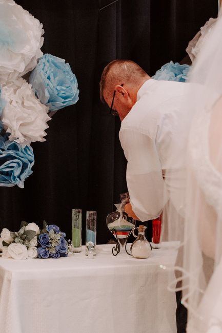 My husband pouring his sand for the unity sand ceremony!