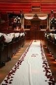 I need decoration ideas for our new ceremony venue, something besides those ball things! **pix**