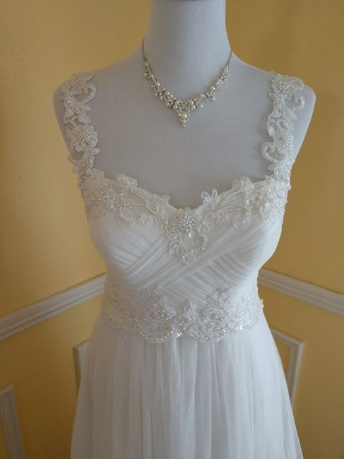 Added lace on the bodice, and the lace on shoulders is just pinned so far.