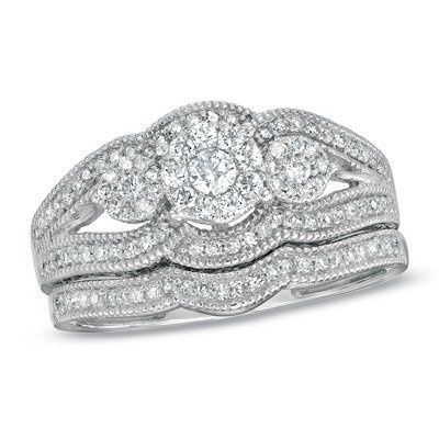 I'd love to see everyone's engagment rings.