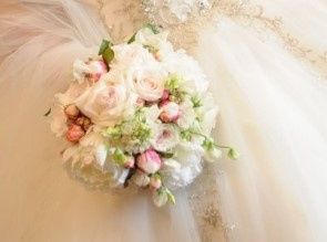Real and artificial flowers in bouquet