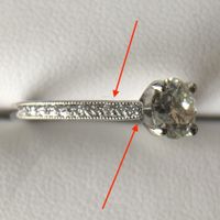 left side of band (slightly crooked)