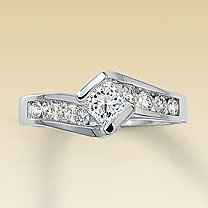 23 small diamonds, and one bigger diamond... I LOVE IT. Lets see some rings my fellow brides.