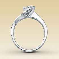 23 small diamonds, and one bigger diamond... I LOVE IT. Lets see some rings my fellow brides.