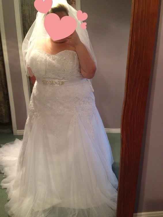 It's a rainy day here on the East Coast, I'm in need of sunshine.  So show me your wedding dress