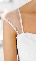 How do you dress up a plain spaghetti strap dress?