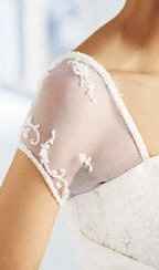 How do you dress up a plain spaghetti strap dress?