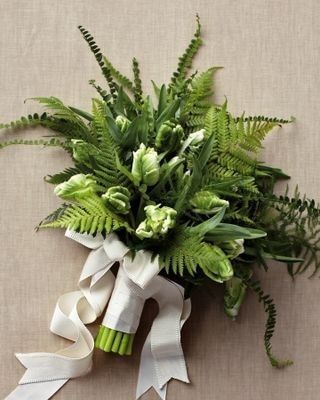 When your dress has flowers, what do you hold?