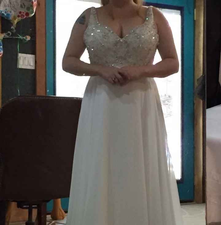 How much did you spend on your wedding dress??