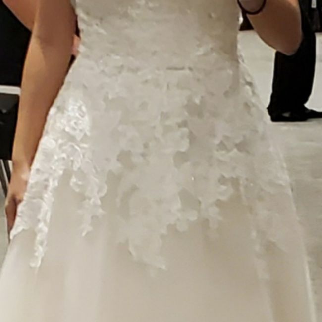 How easy or hard is it to convert strap to strapless/off the shoulder dress? - 1