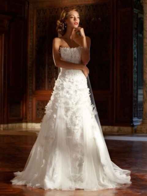 It's a rainy day here on the East Coast, I'm in need of sunshine.  So show me your wedding dress