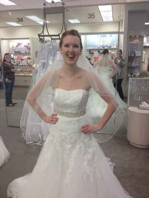 It's a rainy day here on the East Coast, I'm in need of sunshine.  So show me your wedding dress