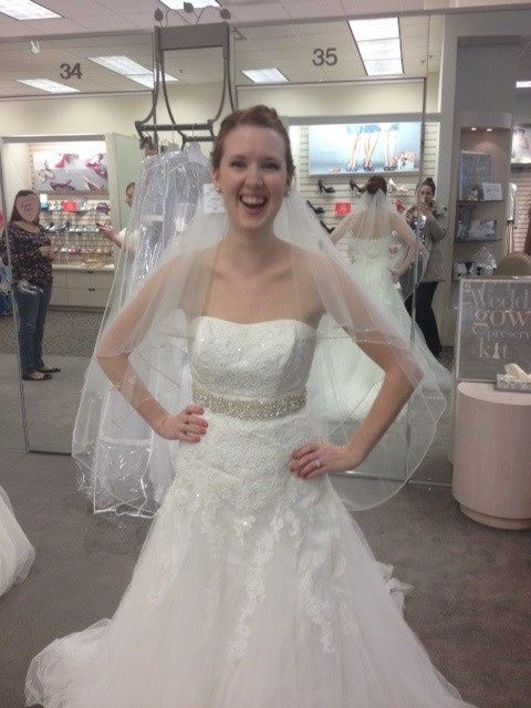 It's a rainy day here on the East Coast, I'm in need of sunshine.  So show me your wedding dress