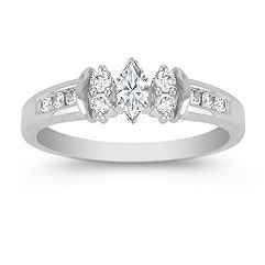 23 small diamonds, and one bigger diamond... I LOVE IT. Lets see some rings my fellow brides.