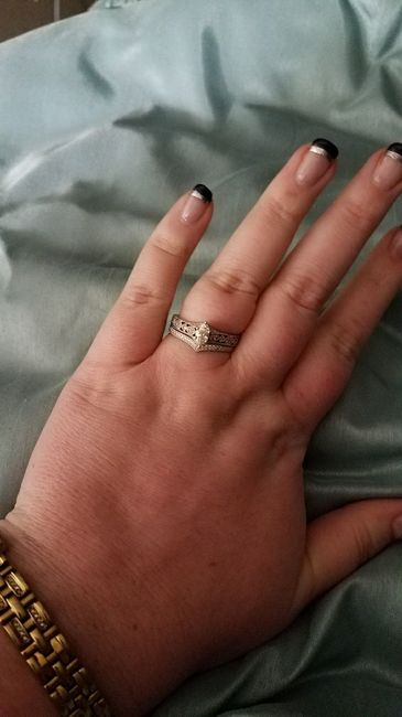 Do you still wear your engagement ring post-wedding? 2