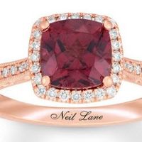 Vow Renewal Ring (10 years)... diamonds and a garnet in rose gold