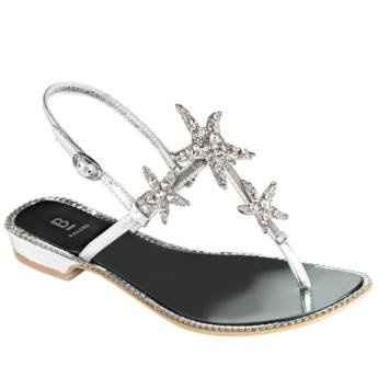 wedge heels on the beach?