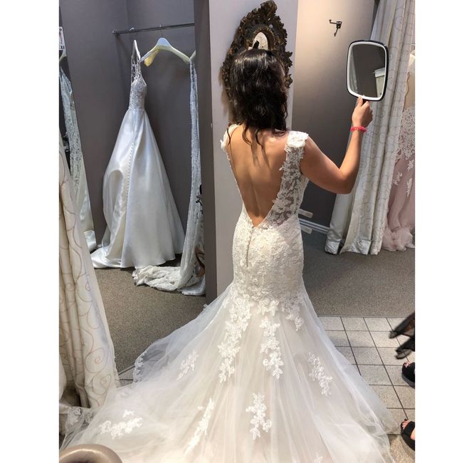 How much was your wedding dress? 3