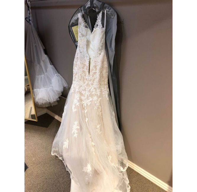 How much was your wedding dress? 4