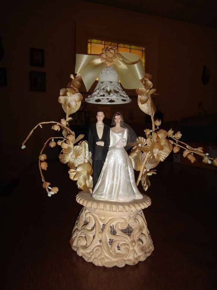 Our heirloom cake topper from Grandparent's wedding.