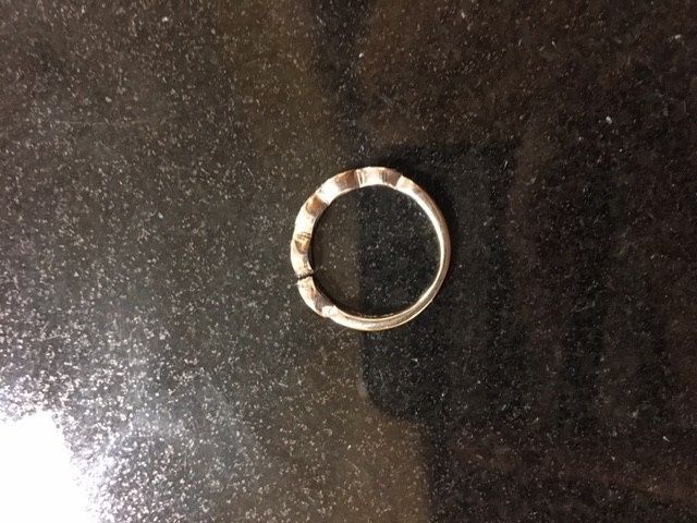 Stuck between two wedding bands!