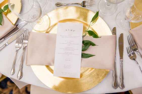 White linens, gold chargers and silver china?