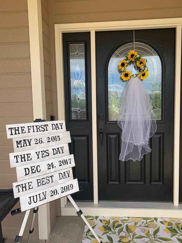 My mother's front door with the wreath & sign she made! We will use the sign at the wedding & hang i