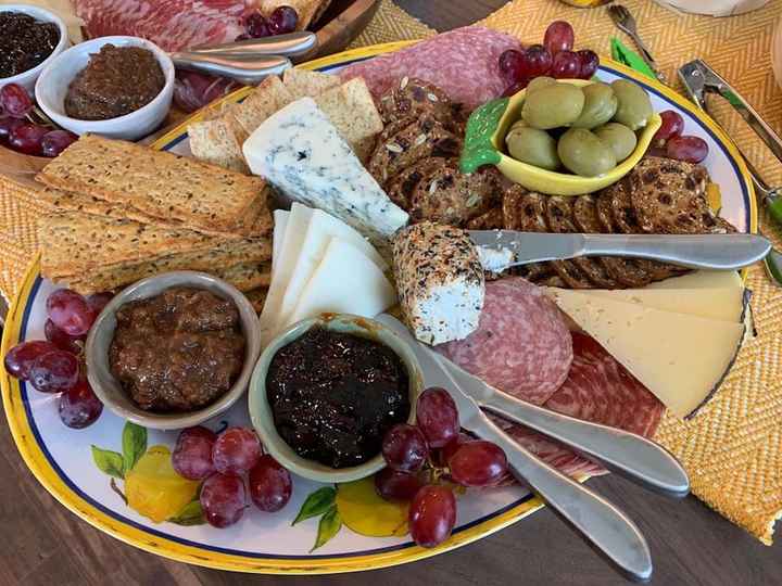 The smaller of the two charcuterie boards.