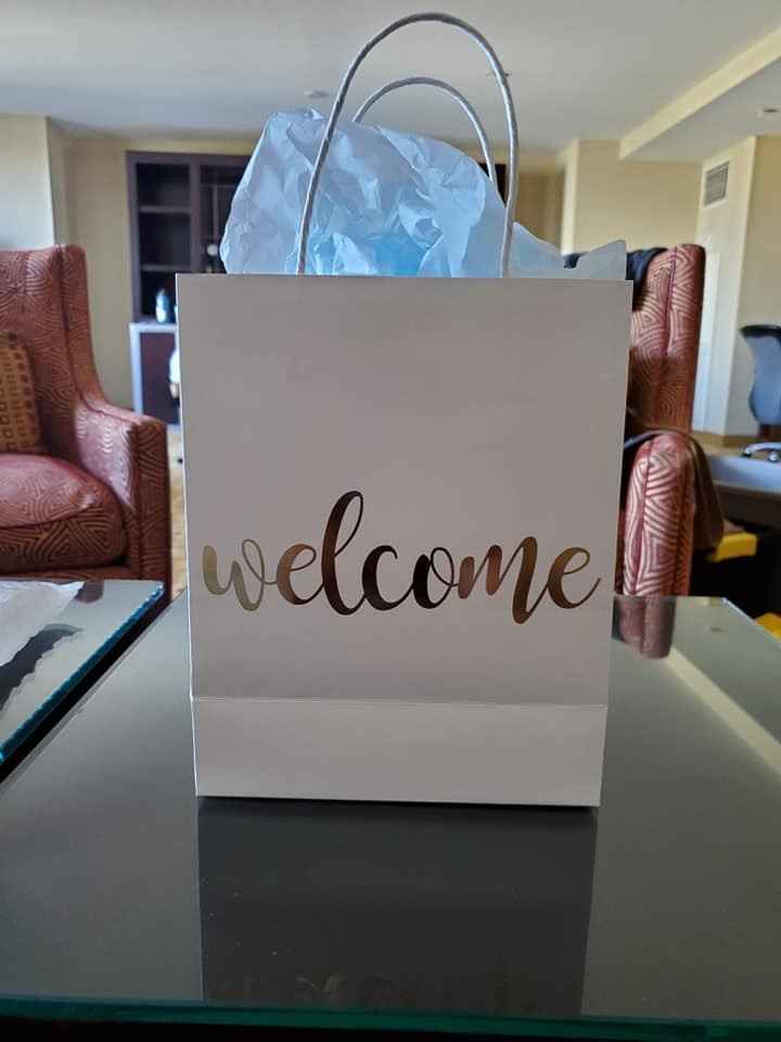 Our welcome bags for our hotel were at the front desk, they handed them out with check in.