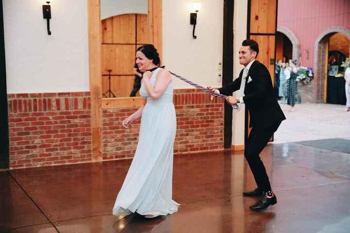 She walked in alone, he ran after her and lasso'd her with a tie, then they walked in together!