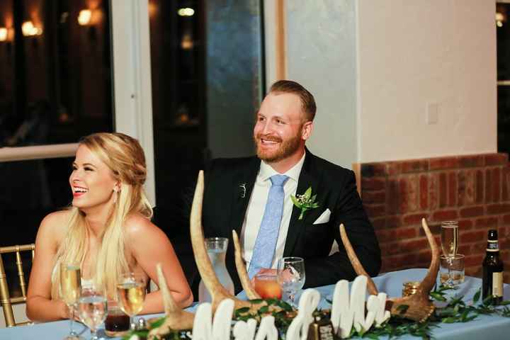 We didn't have a ton of decor but we had antlers & greenery & gold candles for our table decor.