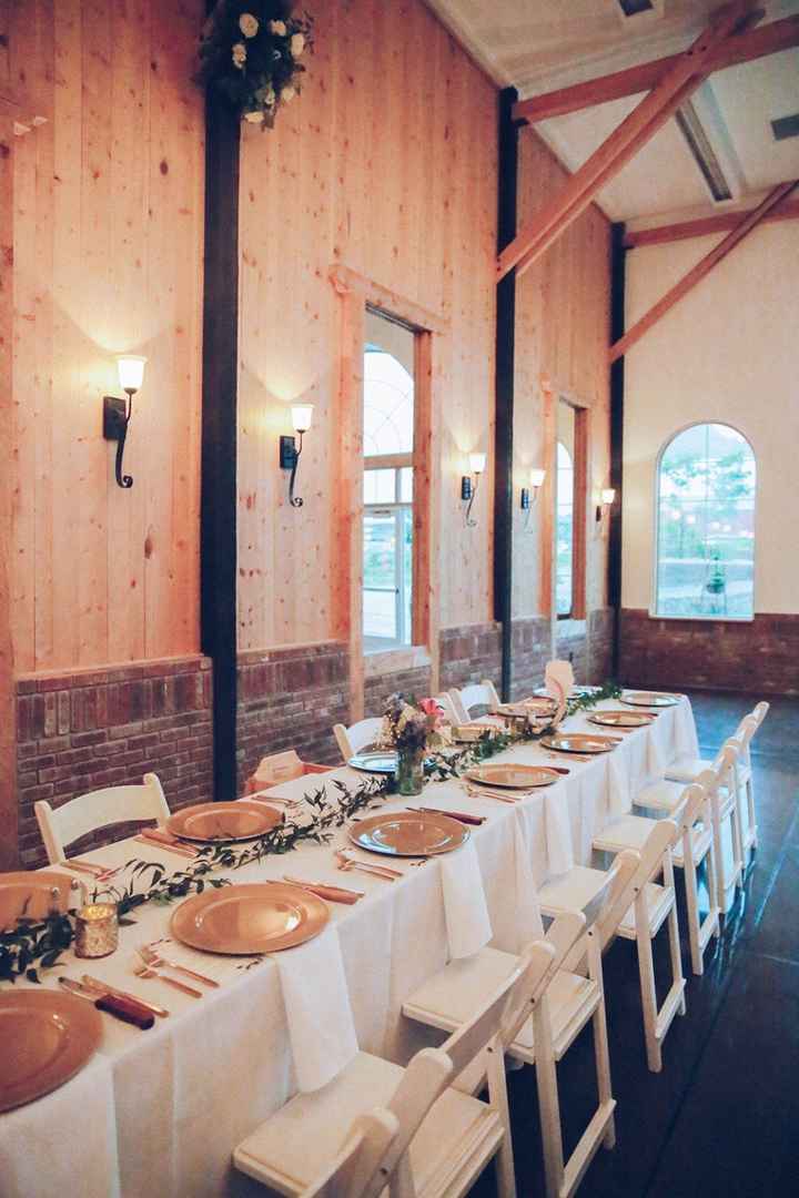 We did gold chargers too & greenery, and just hung our napkins below the chargers and put the menus 