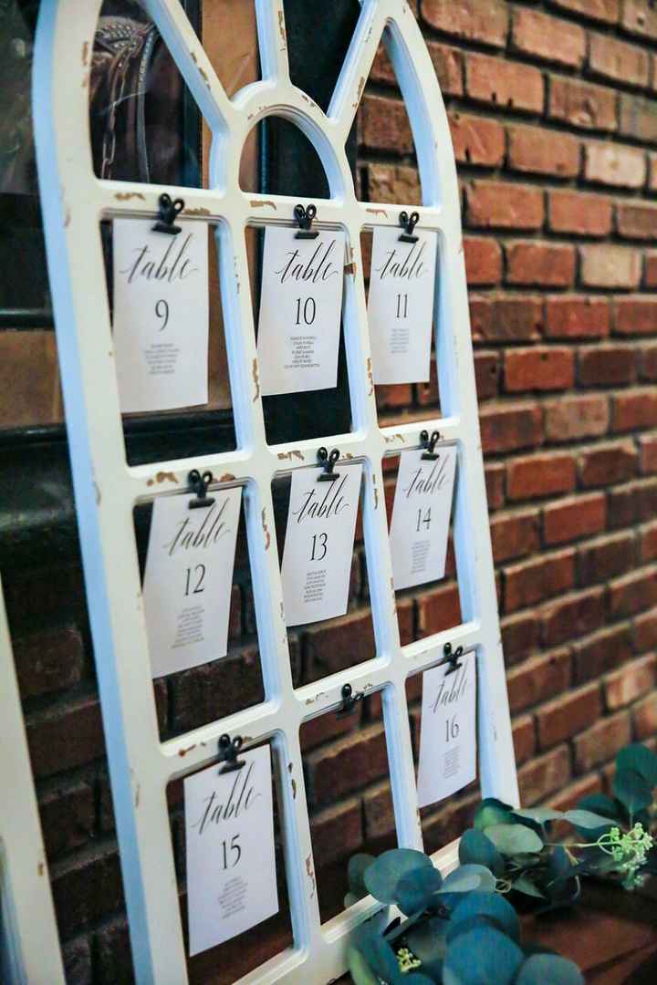 We did a seating chart like this, then place cards on each seat.