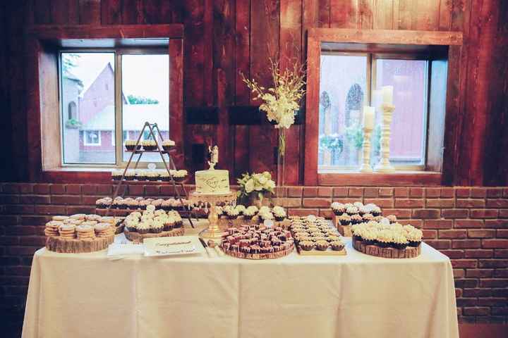 This was our dessert table! Our baker brought all the wood touches, and the florist added the flower