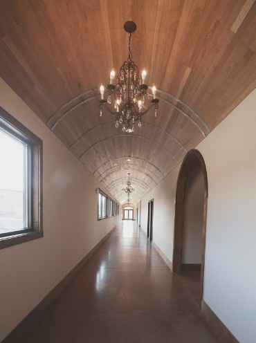 hallway with wine barrel ceiling