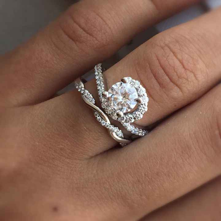 Does anyone have a twisted band diamond engagement ring? And what kind of wedding band did you get?