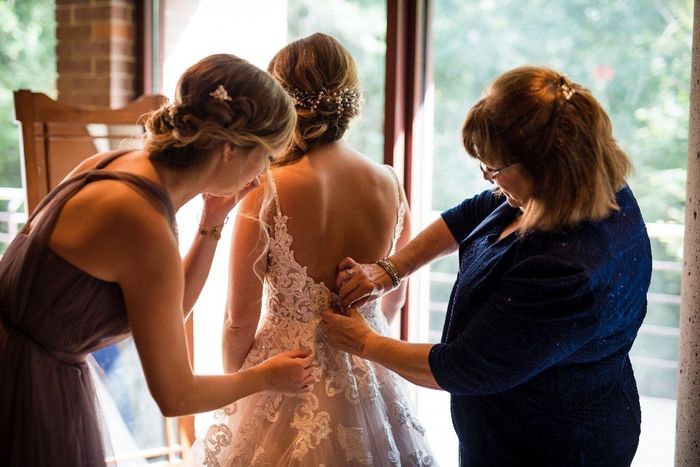 putting on the dress