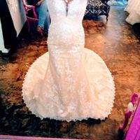 Who is your wedding dress designer? - 1