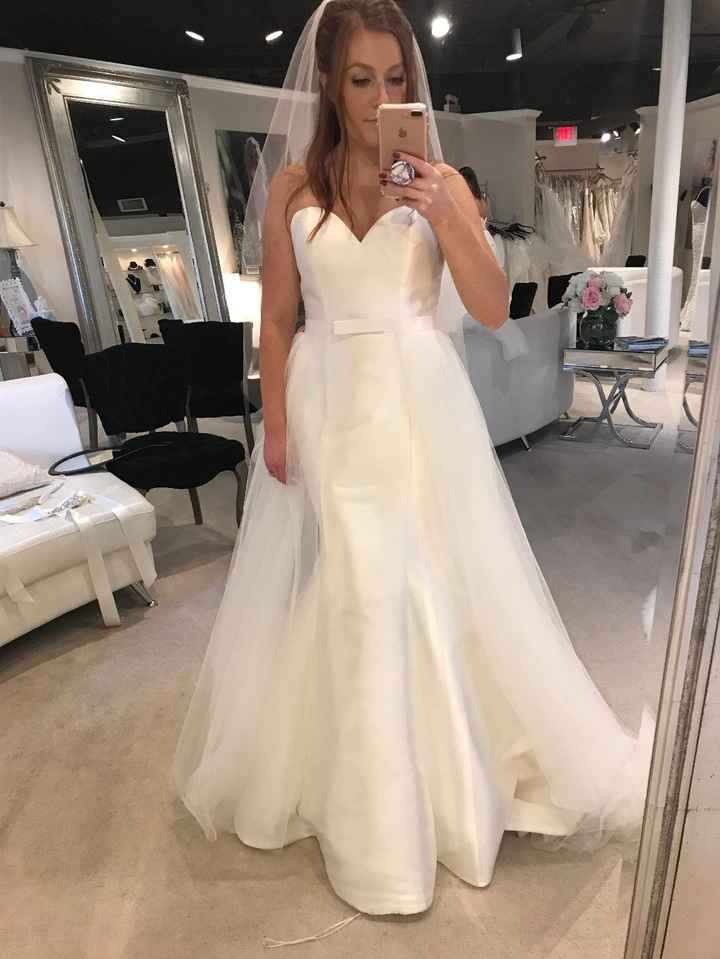 I am also wearing an overskirt! I have a mikado trumpet gown 