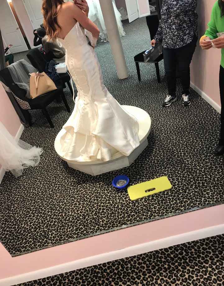 I have a trumpet dress and this was my bustle (just pinned) at my first alterations appointment