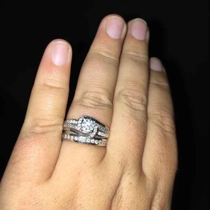 Does anyone have a twisted band diamond engagement ring? And what kind of wedding band did you get?