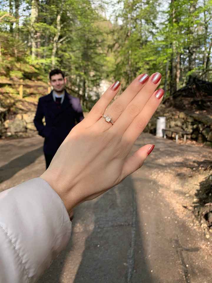Engaged at Neuchwanstein Castle in Germany!